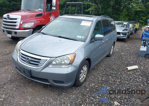 2010 Honda Odyssey Ex-L z USA, uszkodzony, nr VIN 5FNRL3H78AB044087